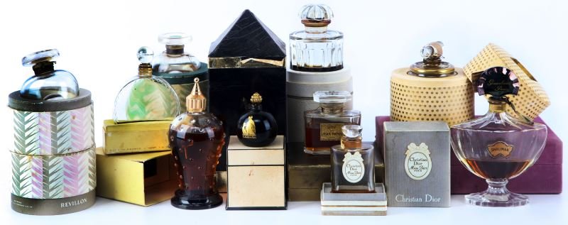 LOT OF TEN VINTAGE LUXURY FRENCH PERFUME BOTTLES: Lot of 10 vintage perfumes in original bottles and boxes, circa mid 1900''s. Lot includes Guerlain "Shalimar," Caron with dimple glass and twist off top, Caron "With Pleasure," Balenciaga "Quadrille,"