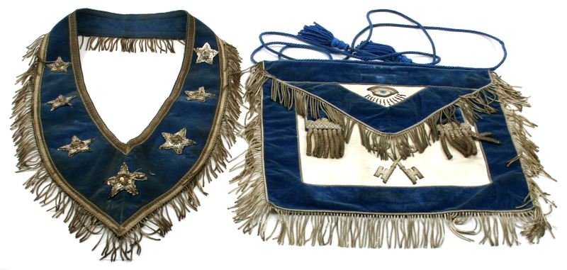 PRESIDENT ANDREW JOHNSON MASONIC APRON & SASH: Masonic sash and apron attributed to the 17th President of the United States, Andrew Johnson (1865 - 1869). Johnson initiated (May 1851), passed, and raised to the Sublime Degree of Master Mason in Gr