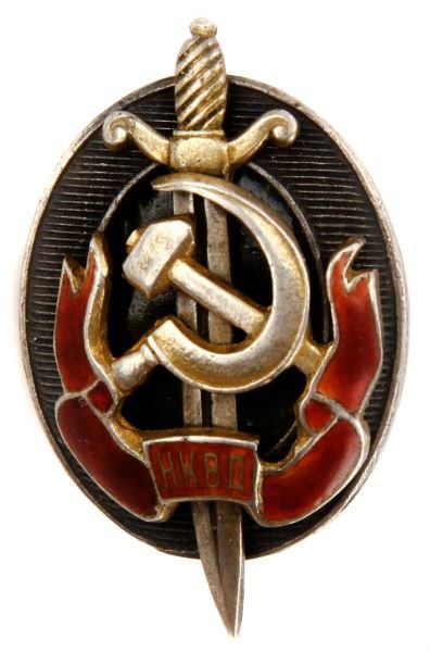 NUMBERED ENAMELED SOVIET RUSSIAN NKVD MEDAL: Narodnyy Komissariat Vnutrennikh Del (The Peoples Commissariat for Internal Affairs) silver plated and gold plated brass enamels. Badge is marked with the serial number "000943" on it's back. Overall 