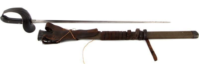 WWI US ARMY CAVALRY SABER PATTON SWORD LF&C 1918: WWi US Army Cavalry Saber Patton Sword LF&C 1918 with scabbard. Scabbard measures approximately 42 inches in length and features some oxidation to the blade. Blade is marked "US NO13, LF&C 1918." Scab