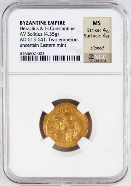 BYZANTINE GOLD SOLIDUS HERACLIUS NGC GRADED MS: Byzantine Empire Heraclius and H. Constantine AV Solidus (4.35g). Struck c.613-641 CE. Two Empowers. Unknown Eastern Mint. NGC graded Mint State; Strike:4/5, Surface 4/5 clipped.