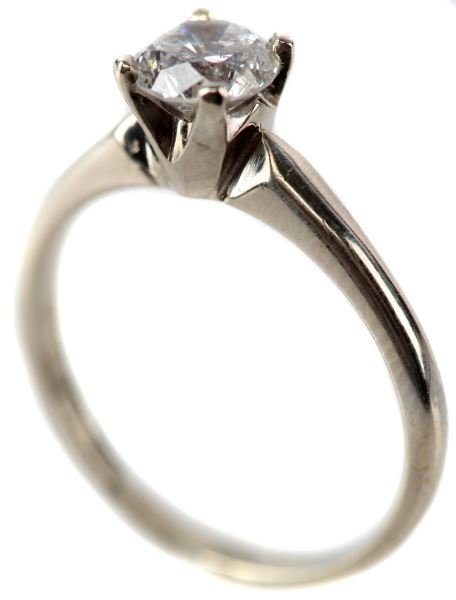 LADIES 14KT WG .63CT ROUND DIAMOND SOLITAIRE RING: Heavyweight white gold tapered shank with four prong barrel type head containing one round brilliant cut diamond weight .63cts, graded G/SI2 with fine make. Diamond set low in mounting for safety Size