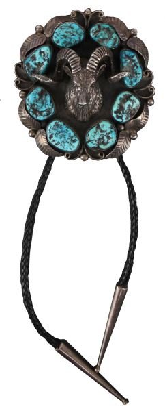 NATIVE AMERICAN SILVER & TURQUOISE BOLO NECKPIECE: Designed and created by Jimmy King, Jr, Farmington, NM. Measuring 90mm across, rams head in center, surrounded by eight turquoise medallions, each between 15-20mm. Sterling ends on bolo. Weight: 159.6