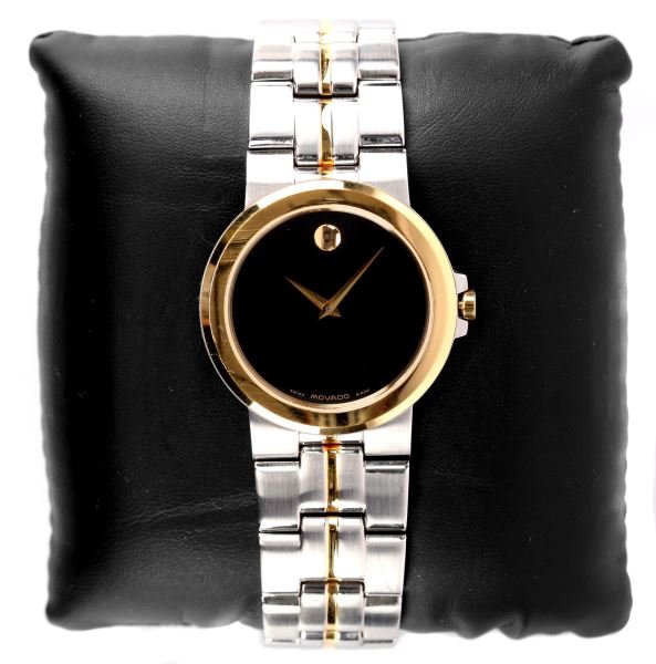 MENS MOVADO 14KT/STAINLESS STEEL WRIST WATCH: Model number 1891, two tone, Museum collection, synthetic sapphire crystal, quartz movement, hidden clasp on matching bracelet. Weight: 78.6 Condition: Very good.