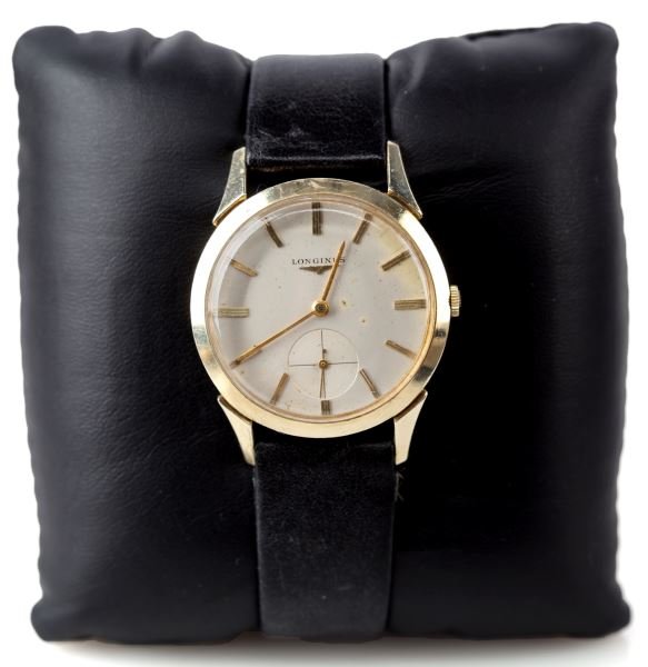 VINTAGE 14K YG MENS LONGINES WRIST-WATCH 1955: Classic styling from 1955, 32.5mm in diameter, 8.5mm thick. 17j Swiss manual wind movement #9,989,259, dating piece to 1955. Case manufactured by Star Watch Company, #2,236,530. White dial, with gold