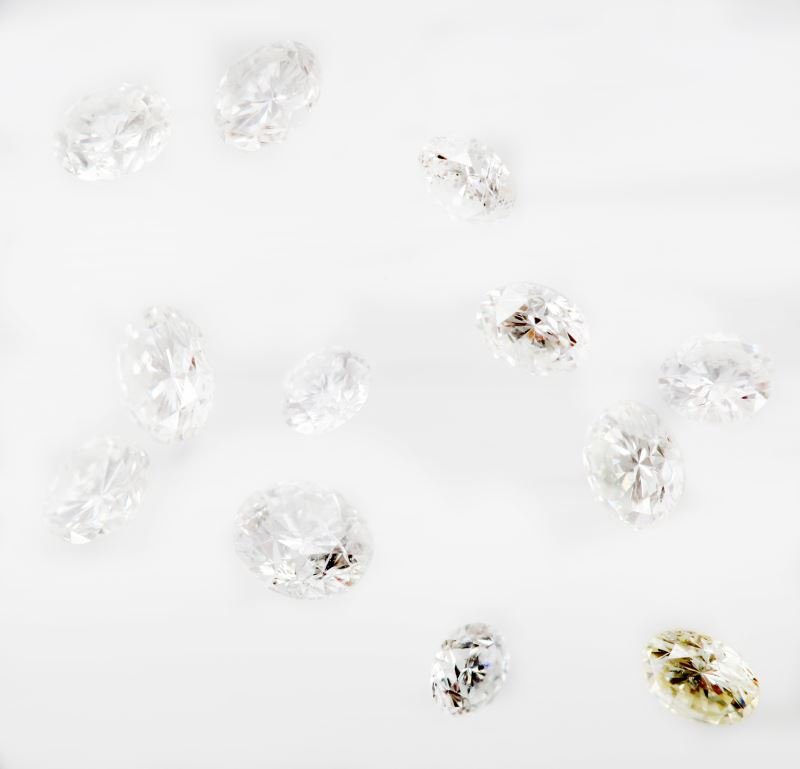 SMALL LOT LOOSE ROUND DIAMONDS 3.16CT TOTAL WEIGHT: Assortment of loose round brilliant cut stones, ranging from .37cts to .15cts. All are white. All clarity graded VS to SI except two, that are I1. These stones face up very well. Twelve diamonds total
