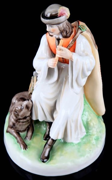ZSOLNAY PECS HUNGARIAN MAN & DOG FIGURINE: Standing just over nine inches, early PECS mark, free of damage or detractions.
