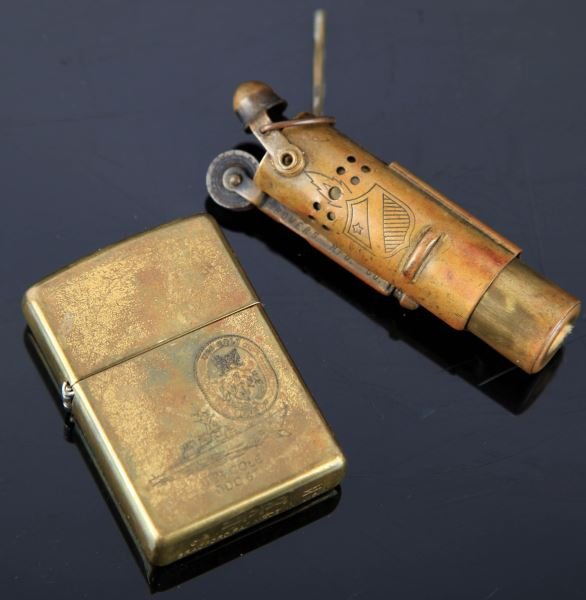 USS COLE ZIPPO & WWI BOWERS TRENCH LIGHTER: Nice condition USS Cole brass finish Zippo, and a WWI trench lighter, also good.