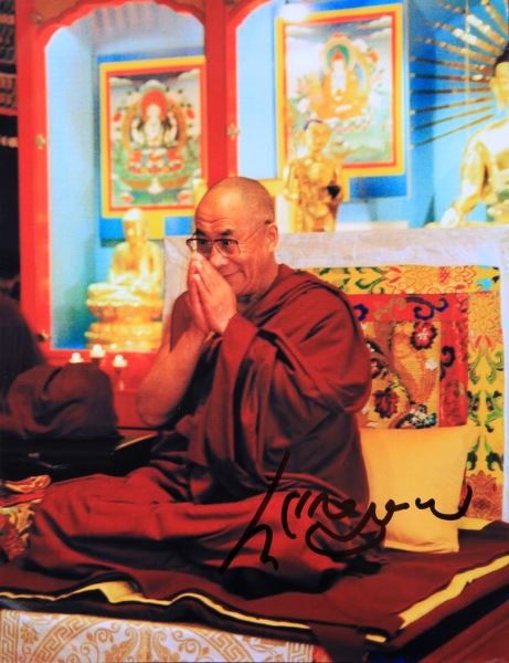 PHOTOGRAPH AND SIGNATURE OF THE DALAI LAMA: Photograph comes with certificate of authenticity from Todd Mueller Autographs. Overall in very good condition.