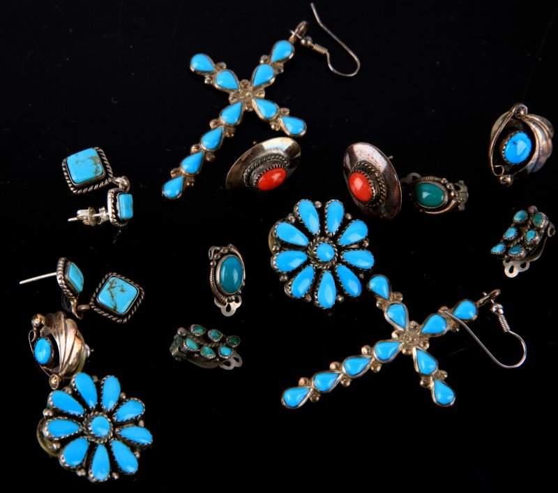 SMALL LOT OF SEVEN SILVER TURQUOISE EARRINGS: Wide assortment of earrings, southwestern motif, silver hand work and bezel setting. Various grades and colors of turquoise. One pair containing argillite. Stud posts, wires backs and clip backs inclu