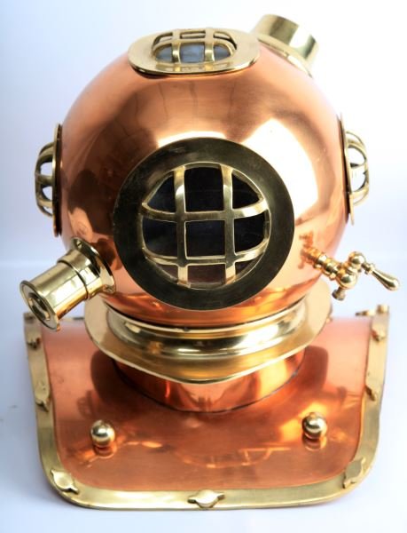 DECORATIVE MARK V BRASS DIVER'S HELMET: Decorative 1980's replica of a US Navy Mark V diving helmet. Helmet stands approximately 18 inches tall, 17 inches from front to back, and 18 inches from side to side at its widest point. Very clean t