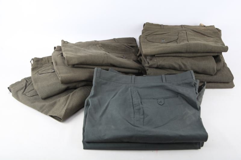 US ARMY MEN'S GREEN SERGE WOOL TROUSERS (10): US Army Men's green Serge wool trousers, lot of 10. The sizes are as follows: 26 x 32, 28 x 34, 26 x 34, (2) 34 S Tropical polyester/wool, 28 x 34, 30R, 34 x 36, 32 x 32, 32 x 34. Three pairs have som