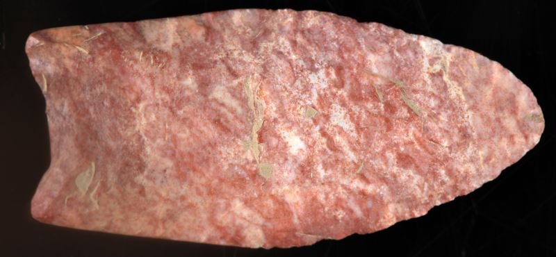 2 1/4 INCH OHIO RED/WHITE CLOVIS ARROWHEAD: Bi- facial fluted, nice red and white chert, debitage in the deepest parts of the recesses.