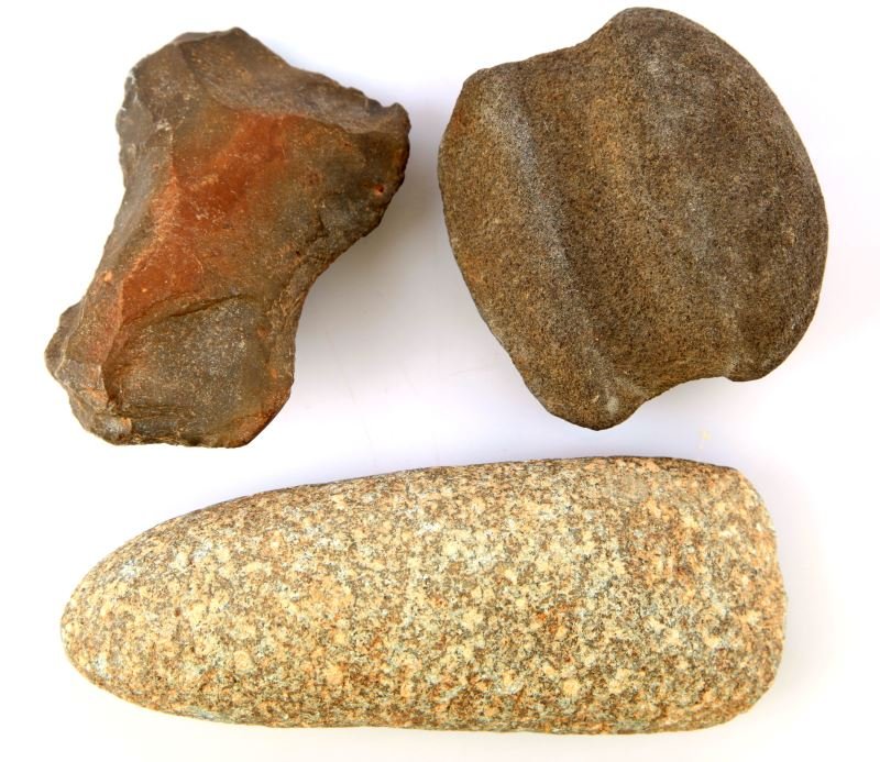 MIDDLE GEORGIA CELT GROOVED AXE & CHIPPED AXE: Includes a five inch Celt non polished, four inch chipped axe, and a 3 inch grooved axe, appears damaged and re sharpened.