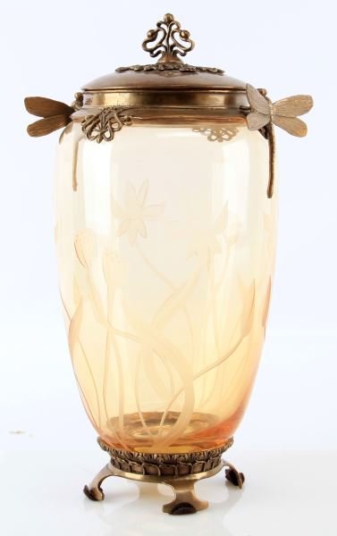 ART NOUVEAU ETCHED GLASS JAR WITH DRAGONFLIES: European etched glass jar with lid featuring ormolu dragonflies and highly stylized flower motif. Bronze base and lip attached to yellow etched glass vessel. 14.5 inches tall (including lid finial) by