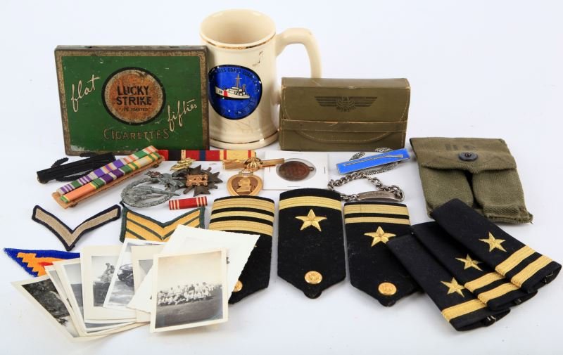 WWI TO VIETNAM MILITARY COLLECTIBLE LOT VARIETY: Includes USCG Owasco WHEC 39 MUG, WWII Navigator dead reckoning A-4 leather satchel named on flap but torn, USMC tie tac, USS Kitty Hawk keel laying fob, sterling CIB clutch back badge, sterling ID br