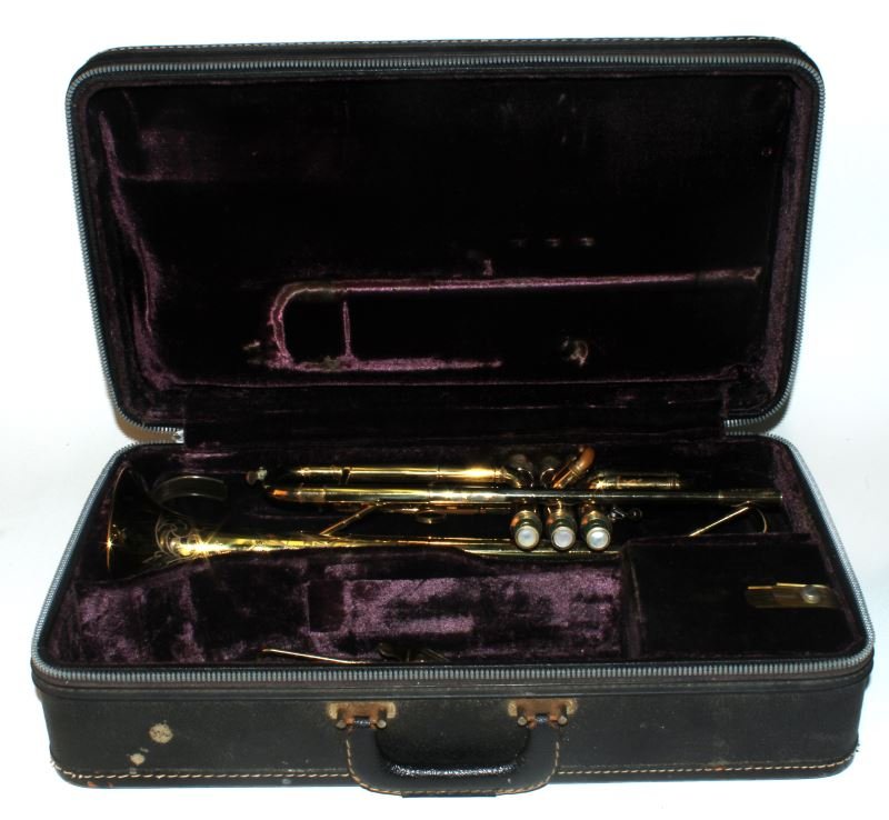 VINTAGE SELMER MADE IN FRANCE K MODIFIED TRUMPET: The preferred trumpet of the legendary Harry James and Louis Armstrong, made in France, late 1970's, this Selmer K modified is in great shape for age; no dents, but some wear showing from playing. Inc