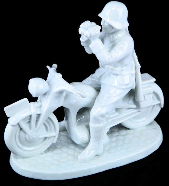 REPRODUCTION ALLACH NAZI BIKER PORCELAIN: Reproduction Allach features a Nazi soldier on a motorcycle. Minor wear is present; overall in very good condition. This lot has a reserve.