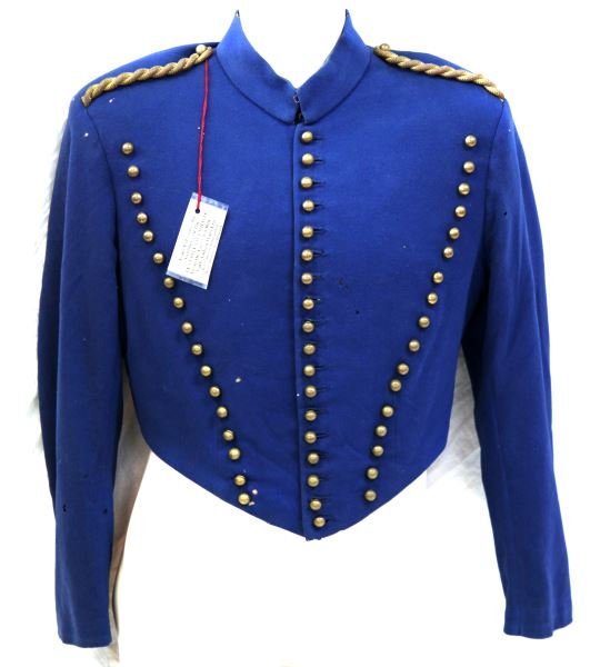 LATE CIVIL WAR ERA PENN MILITIA SHELL JACKET: A late civil war or Indian wars waist length shell jacket with original unmarked brass buttons. 18 working buttons on center and 17 non working up either side. Twisted gold shoulder cords. Fully quilt