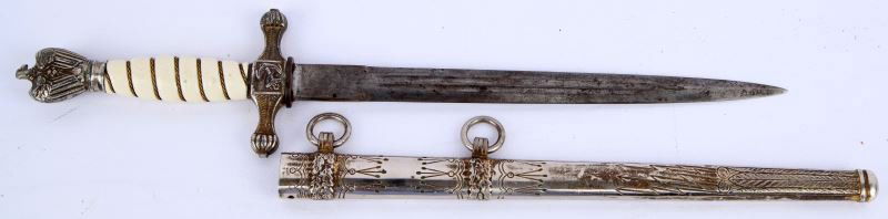 GERMAN WWII NAZI 2ND MODEL EICKHORN DAGGER: Overall very good condition 2nd model German Navy dagger with Carl Eickhorn blade. Thumb release for lock is absent as is th scabbard throat stop. White metal color with traces of gold toning in creva