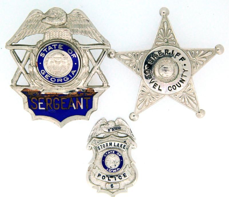 OBSOLETE POLICE BADGE LOT 3 IOWA GEORGIA NEBRASKA: Includes State of Georgia Sergeant, some enamel loss, cap badge, Sheriff Devel County Nebraska badge, Storm Lake Iowa police numbered 6.