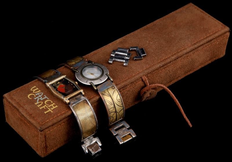 EDUARDO MILIERIS HAND-CRAFTED WATCH LOT 2: Eduardo Milieris (Uruguay artist) finely crafted copper, brass and silver watch lot of two. Men's watches: one circle face limited edition (39/1000), one rectangle face limited edition, colored backgr