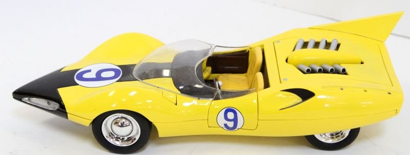 ERTL RACER X SPEED RACER SHOOTING STAR: Ertl 2003 Racer X Speed Racer Shooting Star yellow, measures 11 inches long by 2.5 inches high (1:18 scale). No cracks, scratches, missing pieces or any other detractions, overall in very good conditi