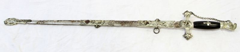 NAMED ETCHED BLADE KNIGHTS TEMPLAR MASONIC SWORD: Bearing the name Thomas B. Scott on the finely etched 27 inch McLilley & Co. blade. Ornately decorated scabbard and drag. Minor surface blemishes to blade, scabbard has some rust and loss of plating. 