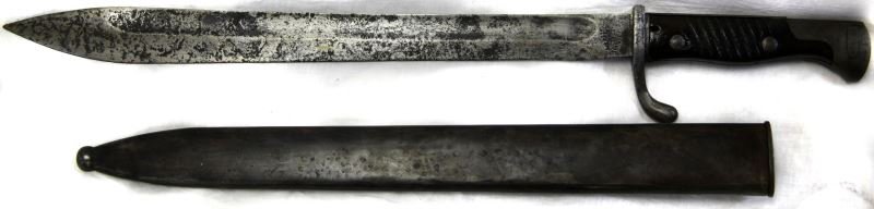 WWI IMPERIAL GERMAN M1898/05 "BUTCHER" BAYONET: World War I German model1898 "Butcher Blade". Includes m1915 steel scabbard. Back of blade marked with a crown over a W 17 and another unknown mark. Maker marked "Act.Ges.vorm". Bayonet shows serious 