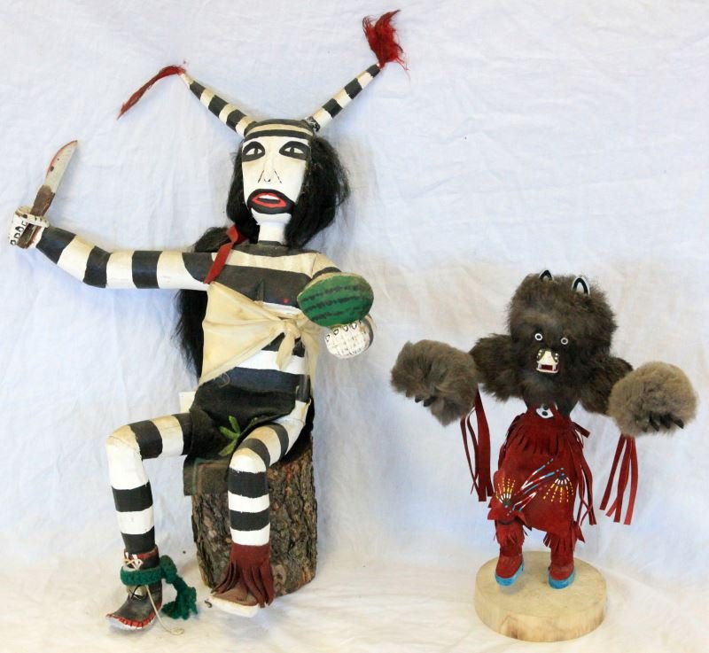 2 NAVAJO MADE KACHINA DOLLS 1 SIGNED BEAR LIYAZZIE: One 17 inch the other 12, the smaller signed, the larger is sitting on log, but has since freed itself from the log and needs to be glued.