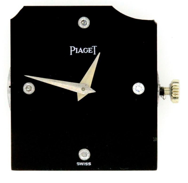 PIAGET 18 JEWEL 9P MOVEMENT #7314988: One genuine Piaget "9P" movement, nineteen jewel, stem manual wind and set, with black diamond dial. Dial corner broken off, hands in good shape. Weight: 4.4 Condition: Runs well; no implied warranty.