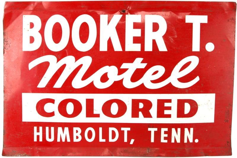 JIM CROW ERA BOOKER T MOTEL COLORED SIGN HUMBOLDT: From Humboldt Tennessee c. 1950's "colored" motel sign, part of two piece sign, 16 by 24 inches, some surface rust and mild denting, the Booker T Motel was listed in Victor Greene's , The Negro Motori