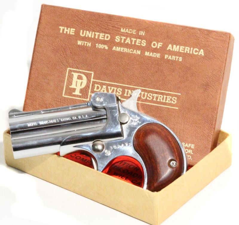 DAVIS D-32 TWO SHOT CHROME DERRINGER PENNY PISTOL: Davis D-32 Derringer bore is clean, frame and grips are in approximately 85%. Comes in original box. Overall in good to very good condition. Caliber: 32 Serial #: 302472