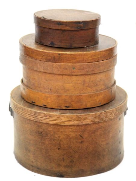 THREE SHAKER STYLE BENTWOOD BANDED WOOD BOXES: Included are three boxes with lids. The smallest is 2.5 by 6.25 inches with nice patina. Small amount of candle wax on lid but does not detract. Overall very good condition. Middle sized box is 9.25 b