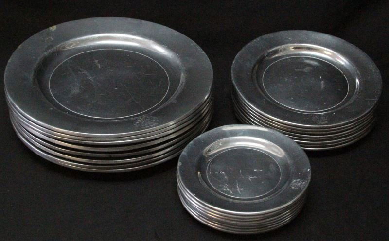 AMERICAN WILTON COLUMBIA PEWTER PLATE SET FOR 8: RWP Wilton-Columbia, PA shiny pewter plate setting for 8. Includes: 8 B&B plates (6 inch), 8 salad plates (8 inch), and 8 dinner plates (10.5 inch). Some need cleaning, some knife marks. Maker's mark