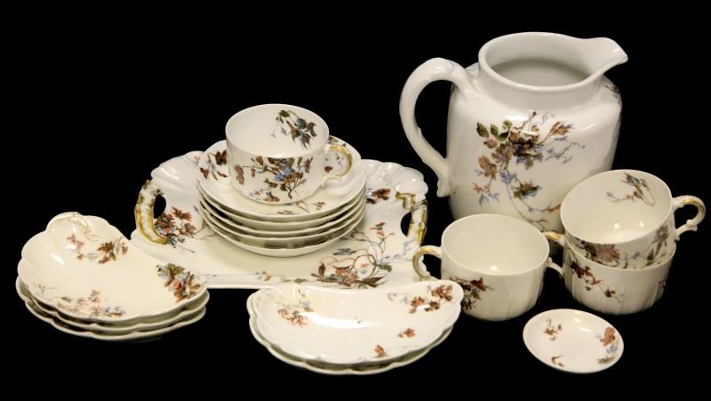 HAVILAND & CO LIMOGES FINE BONE CHINA SET OF 16: 16 piece Limoges fine bone china set. Four cups, four berry bowls measuring approximately 5.25 inches, five bone trays measuring approximately 6 by 3.5 inches, one salt dish measuring approximately 2.