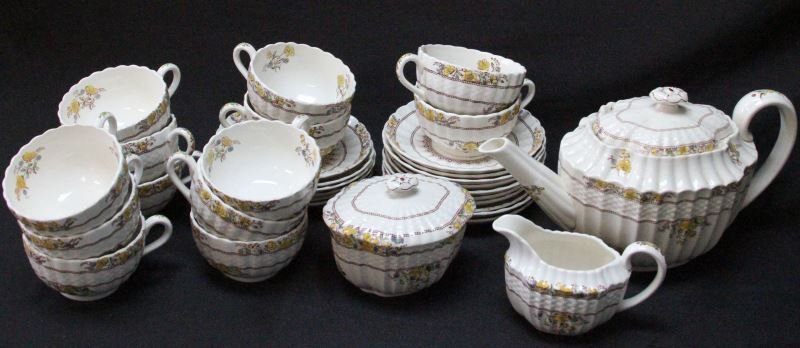 VINTAGE ENGLISH SPODE BUTTERCUP TEA SET FOR 12: Vintage English Spode Buttercup tea set for 12. Group includes: one teapot with lid (11.5 by 5 by 6 inches), one creamer (5.25 by 3 inches), one sugar pot (5 by 4 inches), 13 cups (4.5 by 2.25 inches)