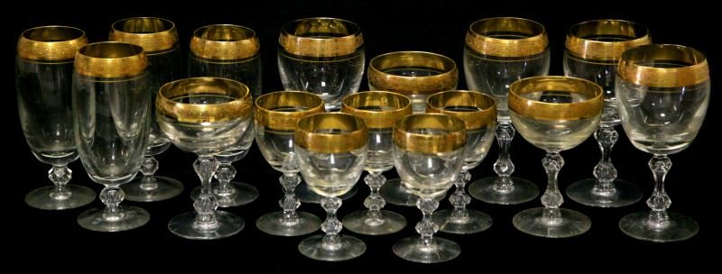 MINTON 24K GOLD RIM CRYSTAL GLASS SET 16: Estate found. Circa 1930's.16 glasses total. Group includes: 3 champagne glasses (5.5 inches), 5 small aperitif glasses (5 inches), 4 water/beer goblets (6.75 inches), and 4 large wine glasses (6.75 i