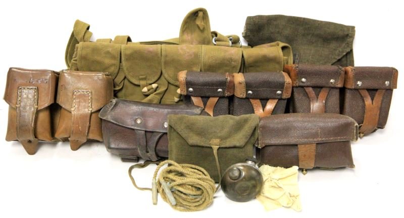 SOVIET RUSSIA AMMO POUCH & CLEANING KIT LOT: WWII Into the cold war, one Nagant cleaning kit , one stripper ammo belt, and five leather ammo pouches.