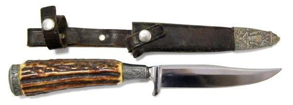 GERMAN HUNTING BOOT KNIFE OTHELLO SOLINGEN BLADE: Measuring 9.25 inches overall, very good blade, monogrammed on pommel GWH, familial crest at scabbard tip, stag handle, Solingen, Rostfrei blade.