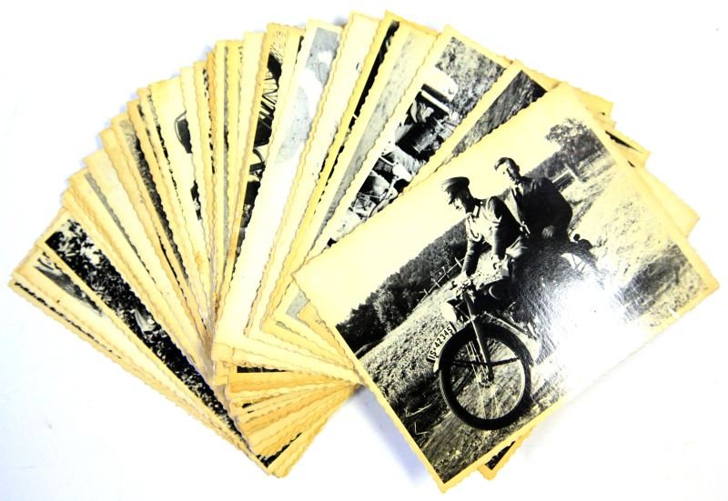 37 PHOTOS OF NAZI BIKERS UKRAINIAN ARCHIVE: Backs of photos are marked "Redeemed". Some yellowing and bending present; overall in very good condition. This lot has a reserve.