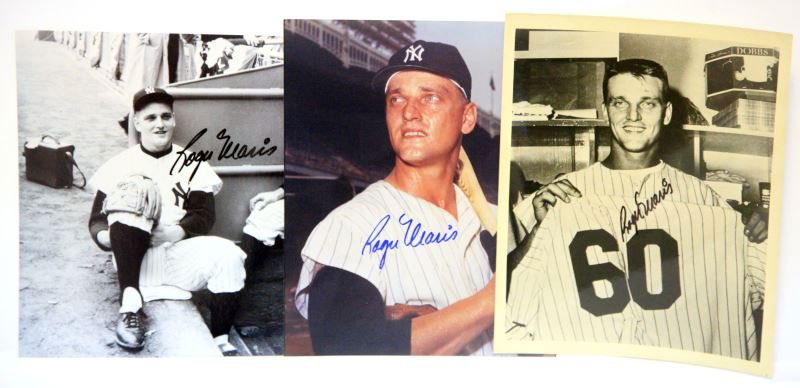 LOT OF 3 AUTOGRAPHED PHOTOS OF ROGER MARIS W/ COA: This lot contains 3 different 8 by 10 inch photos of baseball legend Roger Maris, 2 black and white and one color in Yankee Pinstripes against the backdrop of Old Yankee Stadium. Signed in Blue Sharpi