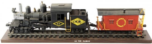 42 TON CLIMAX E2 TRAIN ELK RIVER TRAIN MODEL: Hand-carved and painted model wood and metal locomotive. 42 Ton Climax, E2 Elk River Coal & Lumber Co. mounted on a wood base. In good condition. This lot has a reserve.