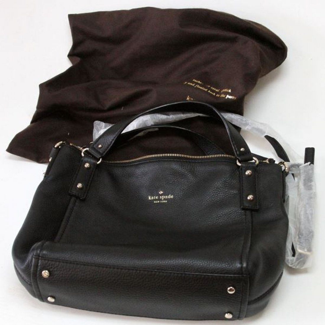 KATE SPADE BLACK PEBBLE LEATHER HANDBAG W DUSTER: Kate Spade black pebble leather handbag with duster, measuring 11" x 14" x 3.5" with handles drop length 4" and one shoulder strap 20". Handbag is in very good condition, appears to be unworn.