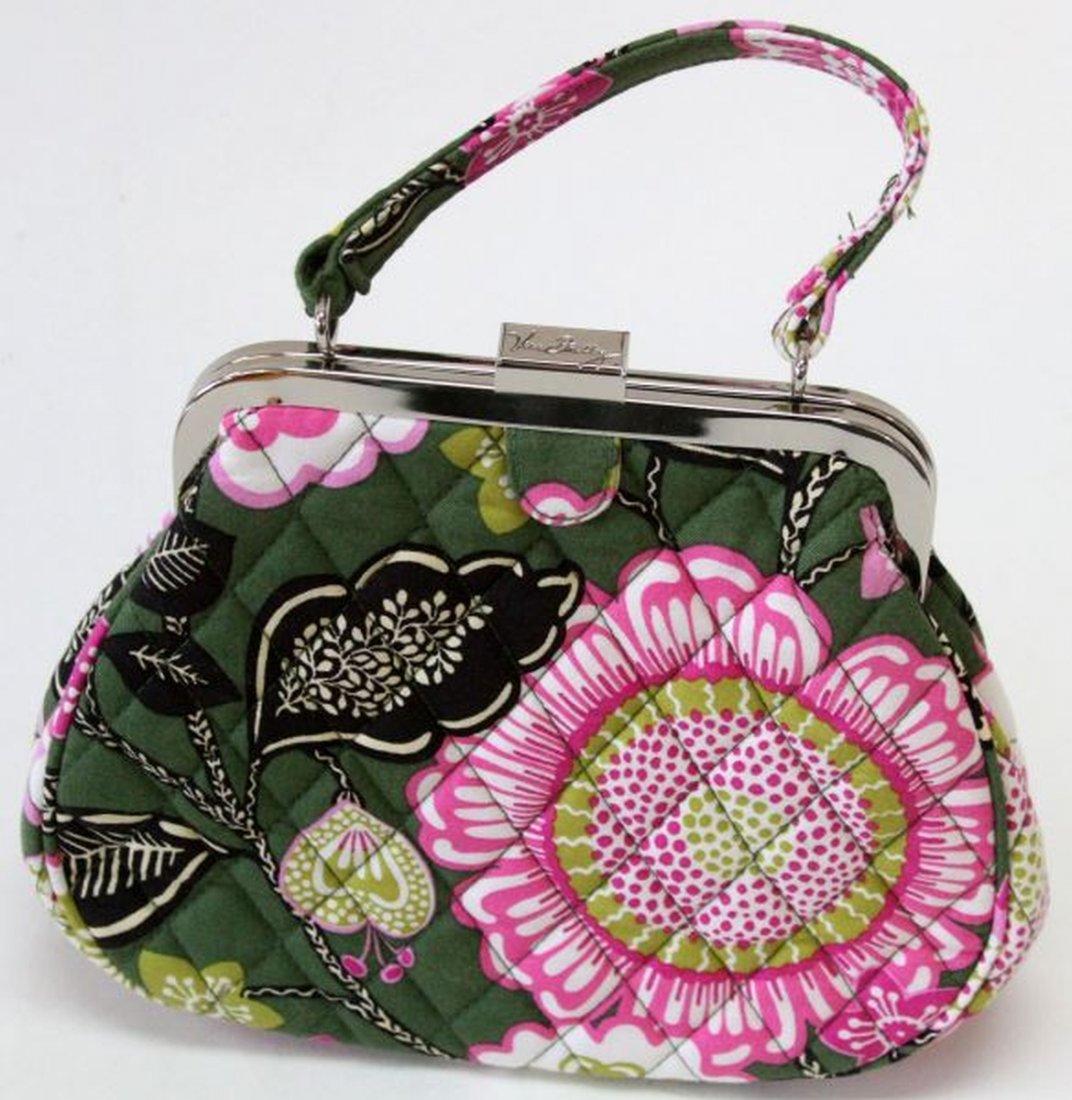 VERA BRADLEY OLIVIA PINK MINI FRAME CROSSBODY: Vera Bradley olivia pink mini frame cross body,measuring approximately 8"W x 7"H x 3"D with 3-1/2"handles and 14" to 26" strap drop. Bag is in very good condition.