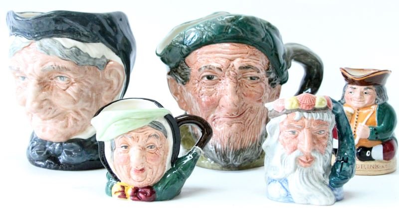 COLLECTORS LOT OF ROYAL DOULTON TOBY MUGS 5 PIECE: Royal Doulton Toby mugs, lot of five, made in England. Includes: large "Granny D5521" (6 inches tall), large "Auld Mac D.5823" (6 inches tall), and three mini Royal Doulton jugs including Honest Measu