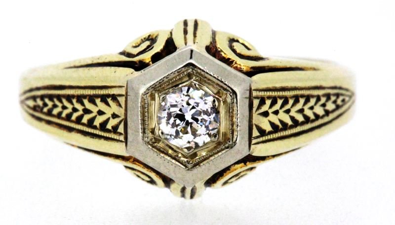 VINTAGE 14KT YG EUROPEAN CUT ROUND DIAMOND RING: Beautiful example of hand engraving; early 1950's era, 10.5mm wide, with white gold hexagonal baker top containing one round European cut diamond, weighing approximately 1/4 carat, graded F-G/VS2. Siz