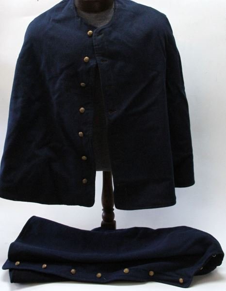 TWO US INDIAN WARS CAPES WITH US & PENNA BUTTONS: Included is a blue/black wool cape with 7 US eagle buttons by AM Button Co. Some mothing and small repairs. Good to very good overall condition. Also included is a similar cape with 7 Pennsylvania but