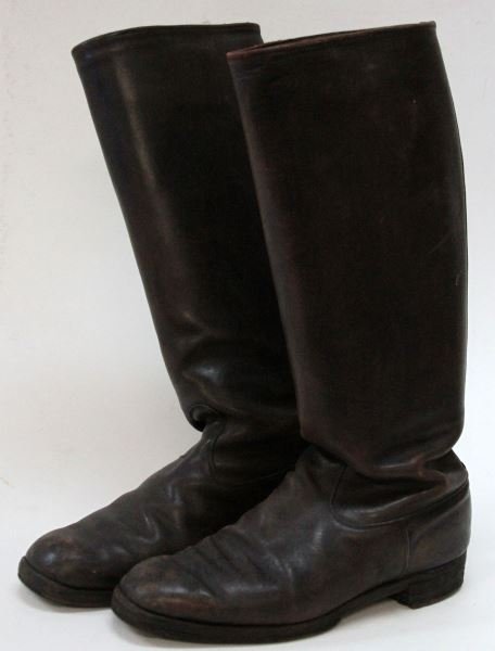 PAIR OF WWII GERMAN ARMY LEATHER JACK BOOTS: Blackened leather Jack Boots with internal boot pulls and hob nails to the soles. Size not marked, sole measures at 11.5 inches in length 4 inches at the widest point. Worn in, some scuffing. Good/ver