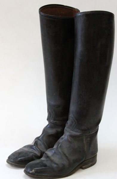 PAIR OF BLACK LEATHER WWII CAVALRY RIDING BOOTS: Officer's boots, with internal pulls and inside marked 48 38 on one side and 05316 2 7 on the other side. 18 inches tall, soles measure 11.5 inches in length. Worn, some scuffing condition good.
